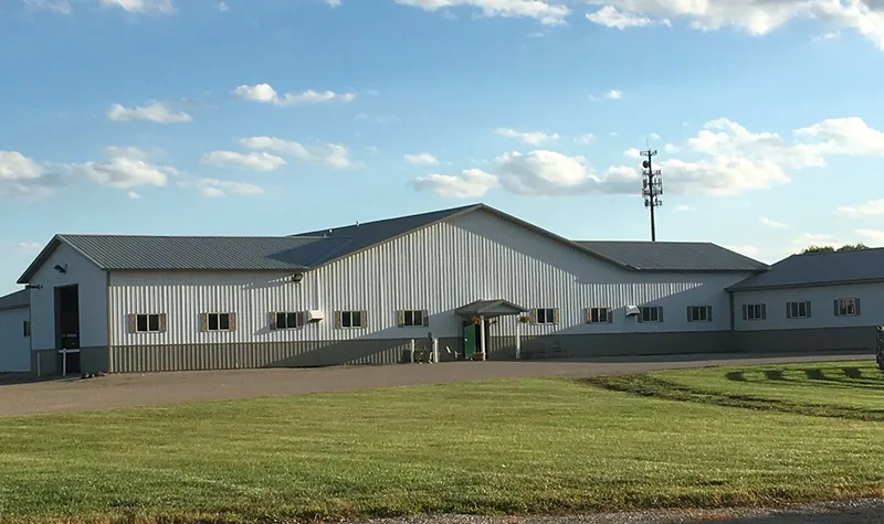 The outside of Highland Ridge Stable's training barn