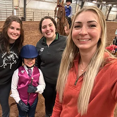 Instructors with academy rider Sarah McClintock Showing